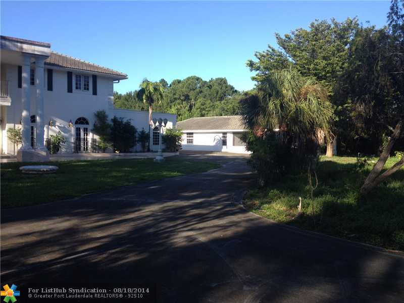 4100 NW 74TH ST, COCOCRK, FL 33073 - Photo 2